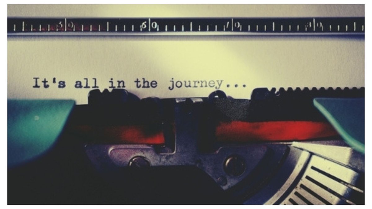 Image of a typewriter with the words 'It's all in the journey'